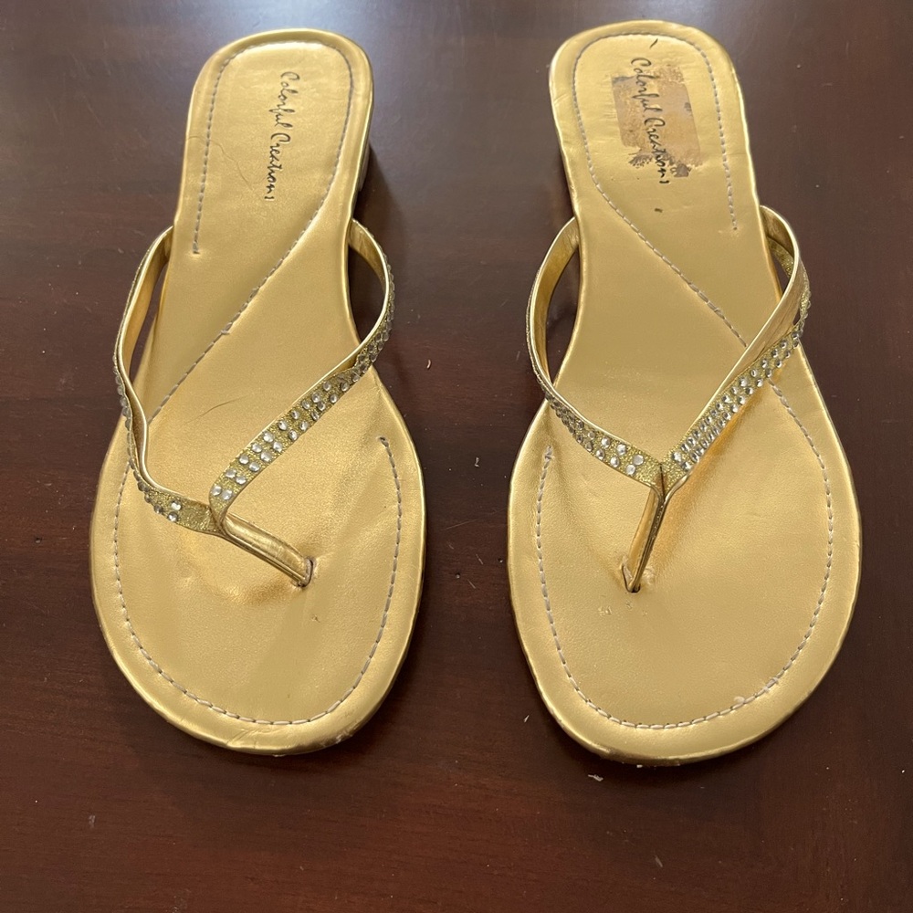 Gold colored rhinestone sandal. Size 10